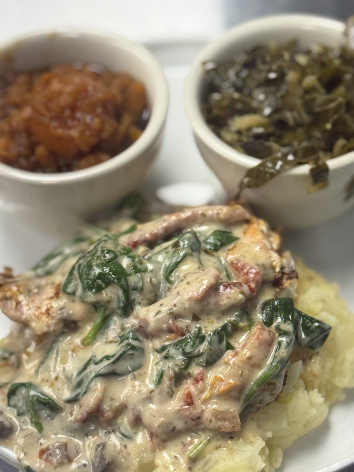Smothered Chicken over Mashed Potatoes